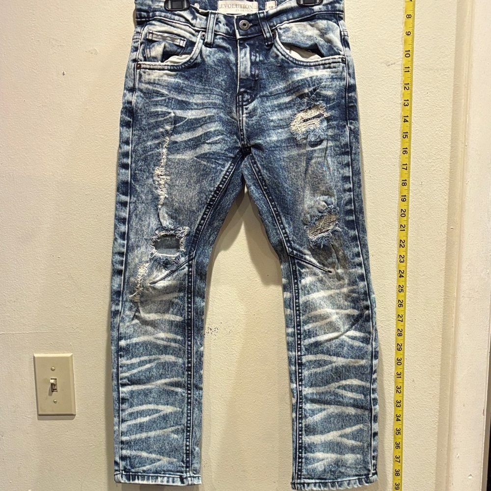 Evolution in Design Distressed Blue Jeans